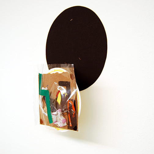 Richard Tuttle / Craft #11  2008 51.5 x 36 x 14 cm cardboard, paper, wire, wood, staple, silicone, tape, plastic and acrylic paint mounted on painted cardboard circle on wood on black cardboard circle